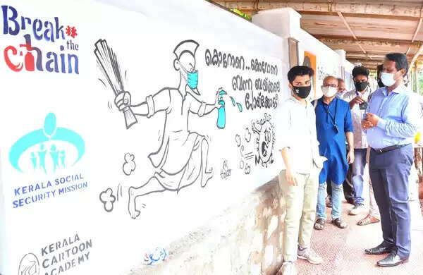 സ്കൂള് ചുറ്റുമതിലില് നിര്മ്മാണം പൂര്ത്തിയാകുന്നതിന് മുമ്പ് കൊറോണ സംബന്ധിച്ച കാര്ട്ടൂണ് വരയ്ക്കാനായി പെയിന്റടിച്ചത് വിവാദമായി; മതിലിന് എന്തെങ്കിലും കേടുപാടുണ്ടായാല് അതിന്റെ ഉത്തരവാദിത്തം പി.ടി.എയ്ക്കോ അധ്യാപകര്ക്കോ ഏറ്റെടുക്കാനാവില്ലെന്നും ഇടപെടണമെന്നും ആവശ്യം, വര പൂര്ത്തിയായ ചിത്രങ്ങള് ജില്ലാ കളക്ടര് നാടിന് സമര്പ്പിച്ചു