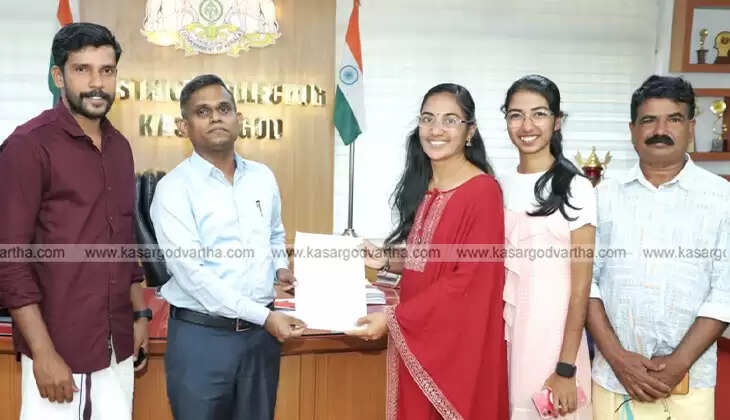 Election counting officials working on ballot boxes