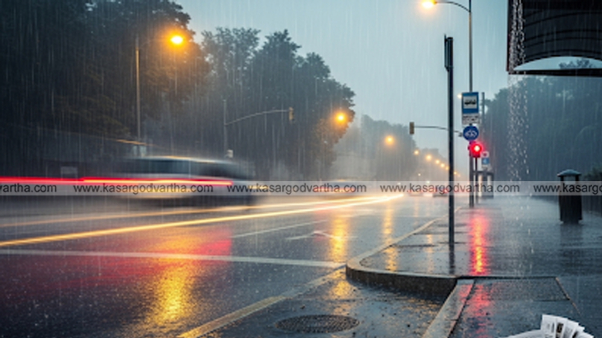 Image showing heavy rain and a district holiday notice for Kasaragod.
