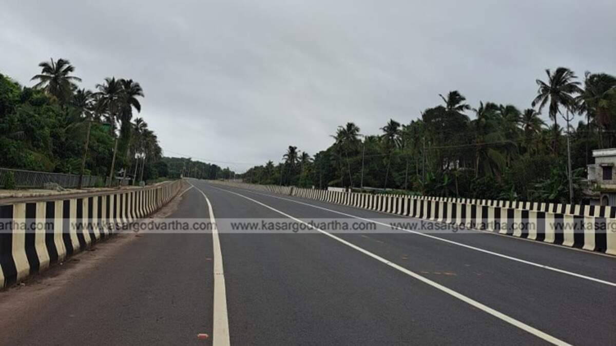 Concrete barriers and construction material on a road in Kasaragod.