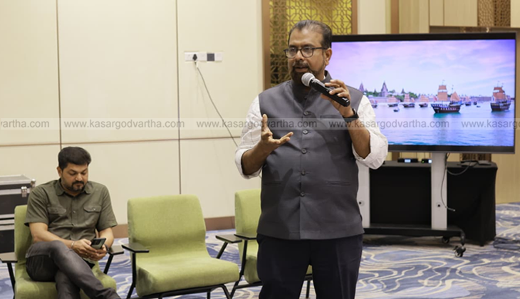 An image of the Vizhinjam International Seaport with cargo ships and cranes.