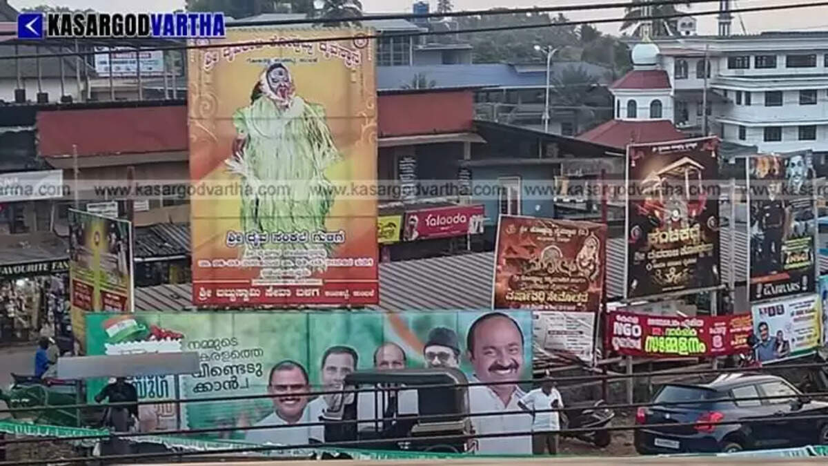 Illegal flex boards on a busy road obstructing public view.