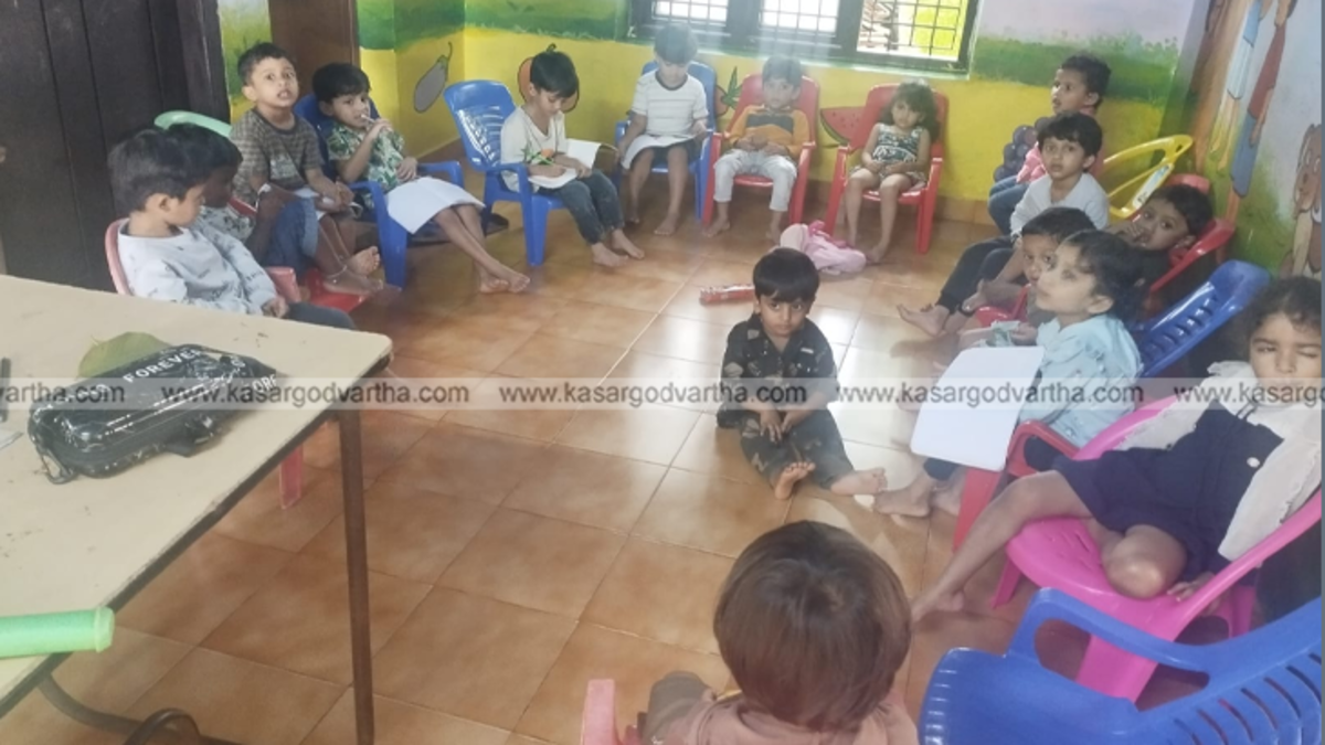 Anganwadi children at a play area inside a school.