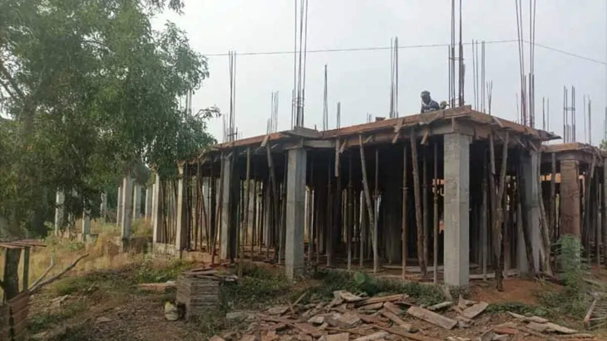 A construction site of a housing project for fishermen in Kumbla, Kerala, showing unfinished work.