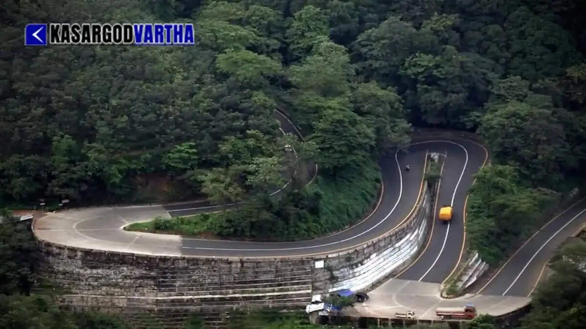 Container lorry stuck at 6th hairpin bend of Thamarassery Churam; traffic partially disrupted.