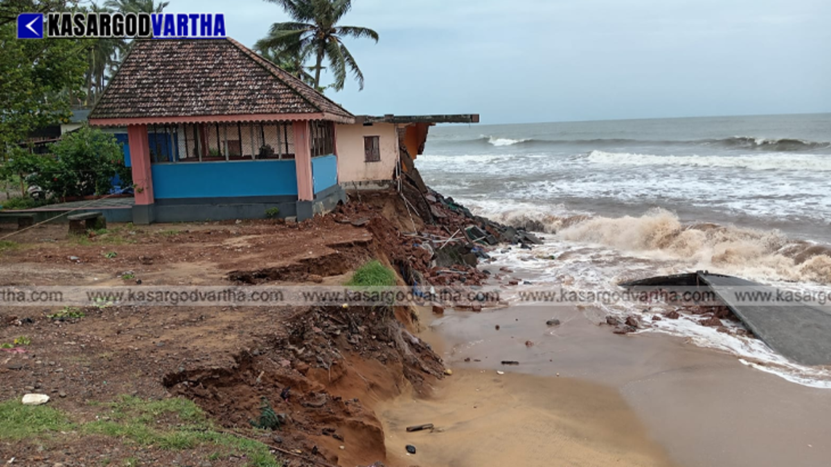 Sea waves hitting the shore in Kasaragod with destroyed structures visible.