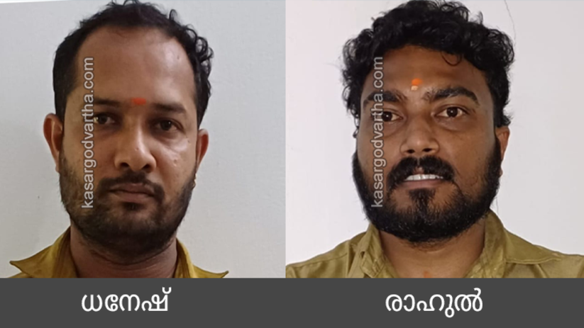  Police in Kasargod arresting two autorickshaw drivers.