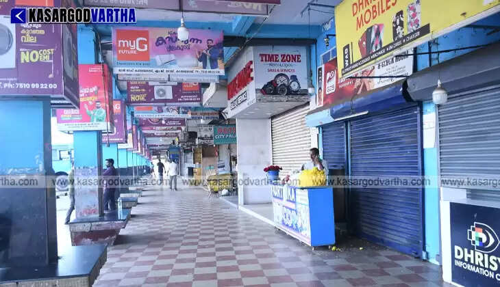 Stationary buses and empty roads in Kasaragod town during the national strike.
