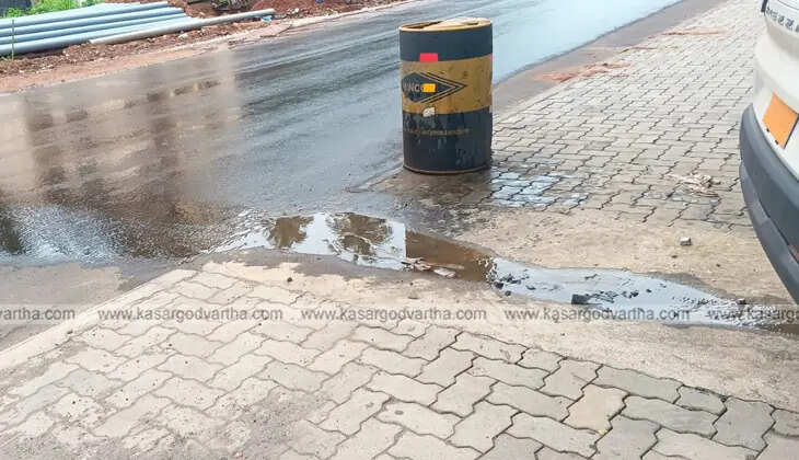 Rainwater falling from the elevated National Highway bridge at Kasargod.