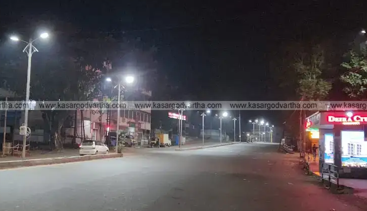  A street view of Kasaragod town at night with closed shops.
