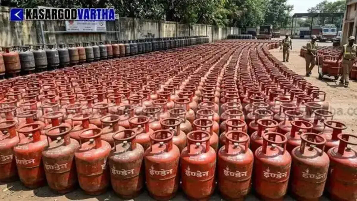  Red LPG cylinders lined up at a distribution agency representing new booking rules for 2026.