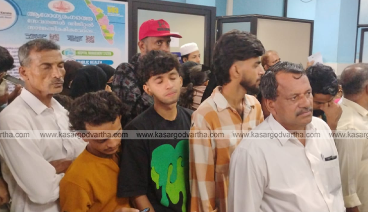 Long queue of patients waiting at the OP counter of Kasaragod General Hospital.