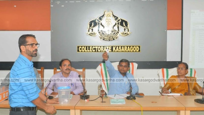 Officials conducting draw of lots for ward reservation at Kasaragod