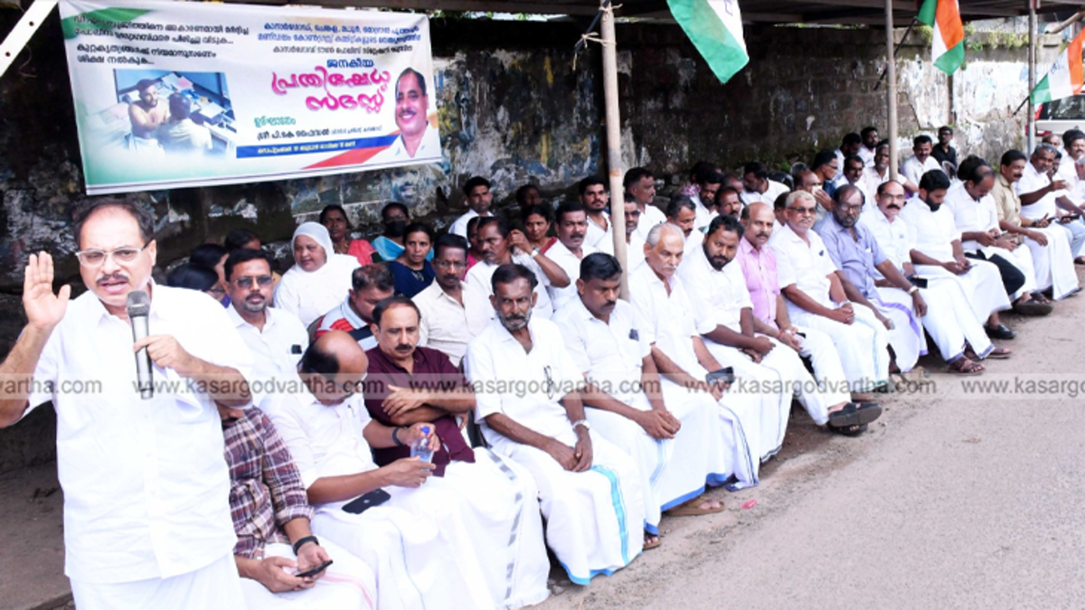 PK Faisal speaking at a protest against police brutality in Kasaragod.