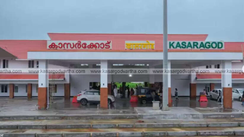  A representative image of a railway station platform with people waiting for a train.