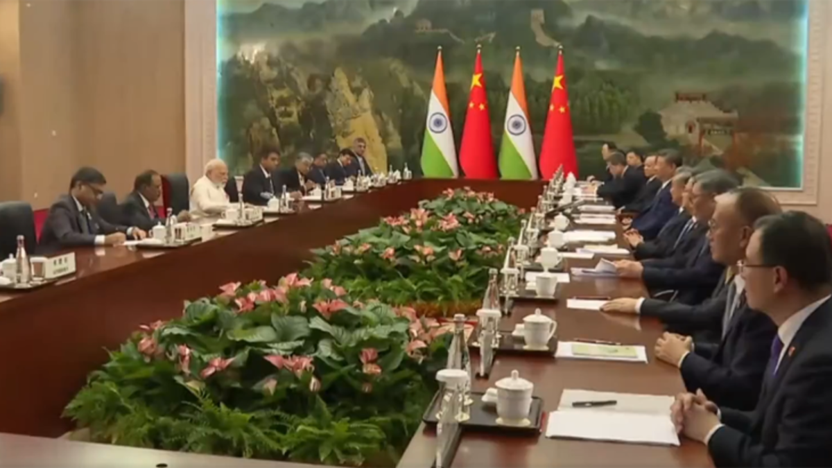 A group of world leaders from SCO member countries at a summit.