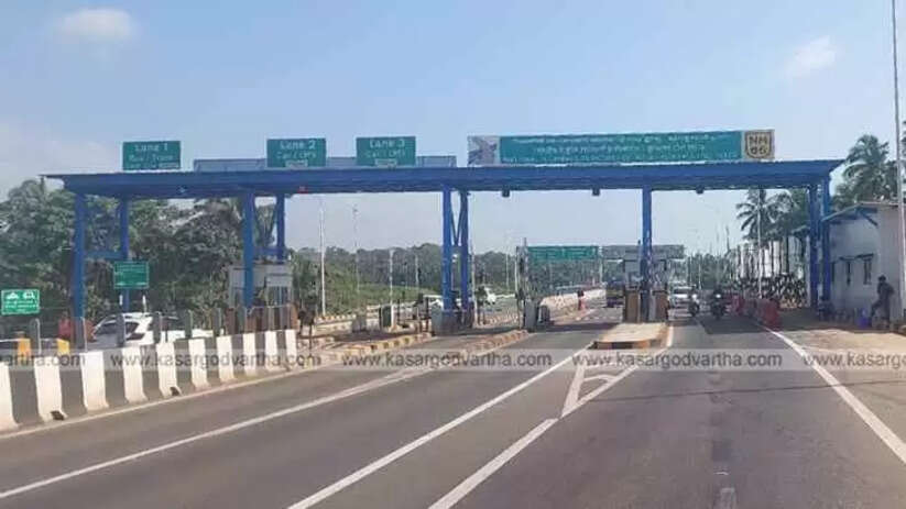 Fully constructed Arikkady Toll Gate with computer systems and passing sensors.