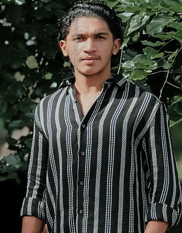  Five Kasaragod students selected for Mangalore University football team posing together.