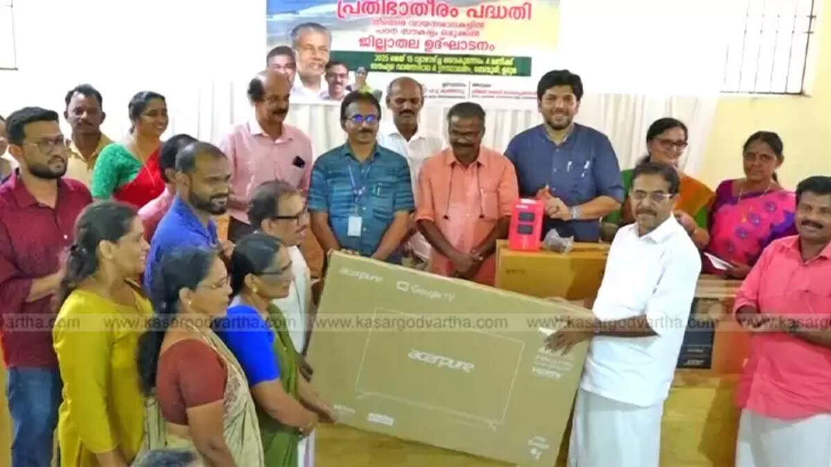 Advocate C.H. Kunjambu MLA distributing equipment at the inauguration of Prathibha Theeram project in Uduma Bewoor.