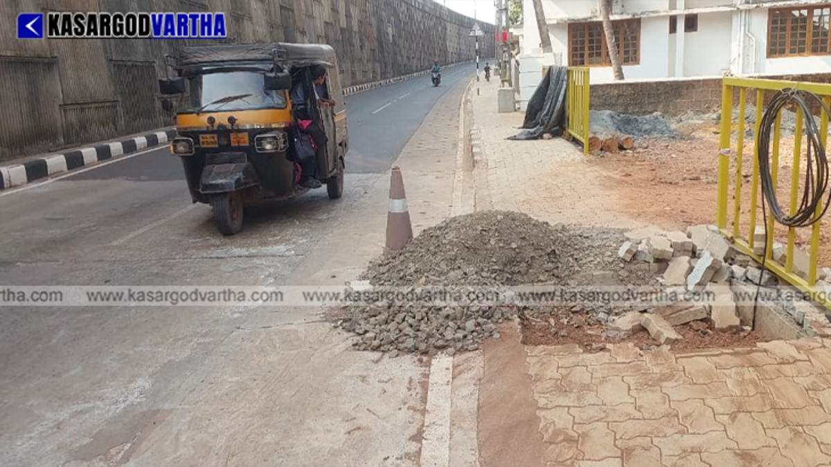  Dug up sidewalk on the national highway at Mogral posing threat to pedestrians
