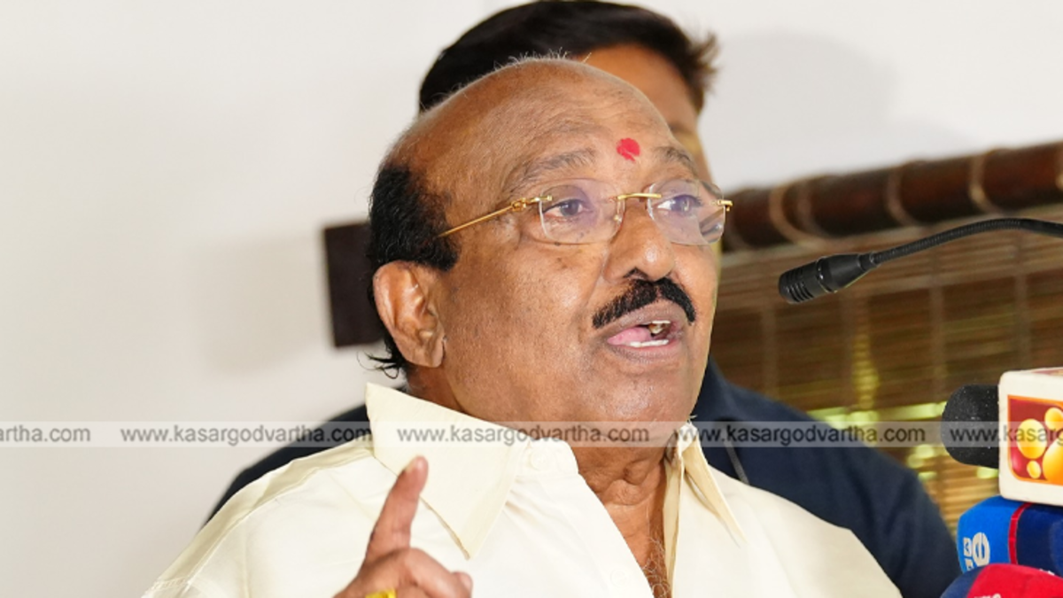  Vellapally Natesan smiling, with a graphic of Padma Bhushan medal.