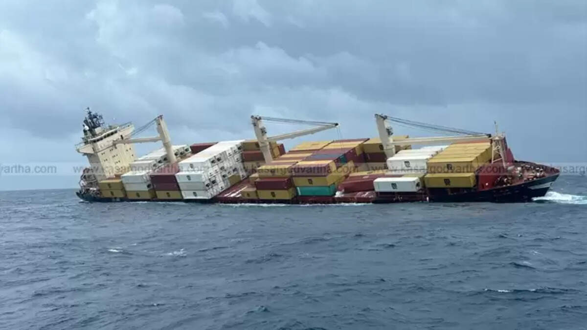 A large cargo ship partially submerged or sinking in the sea.