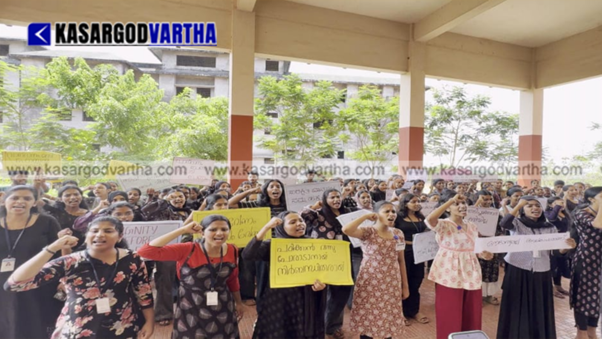 A large group of dynamic nursing student community representatives holding placards and shouting slogans during an official campus strike setup.