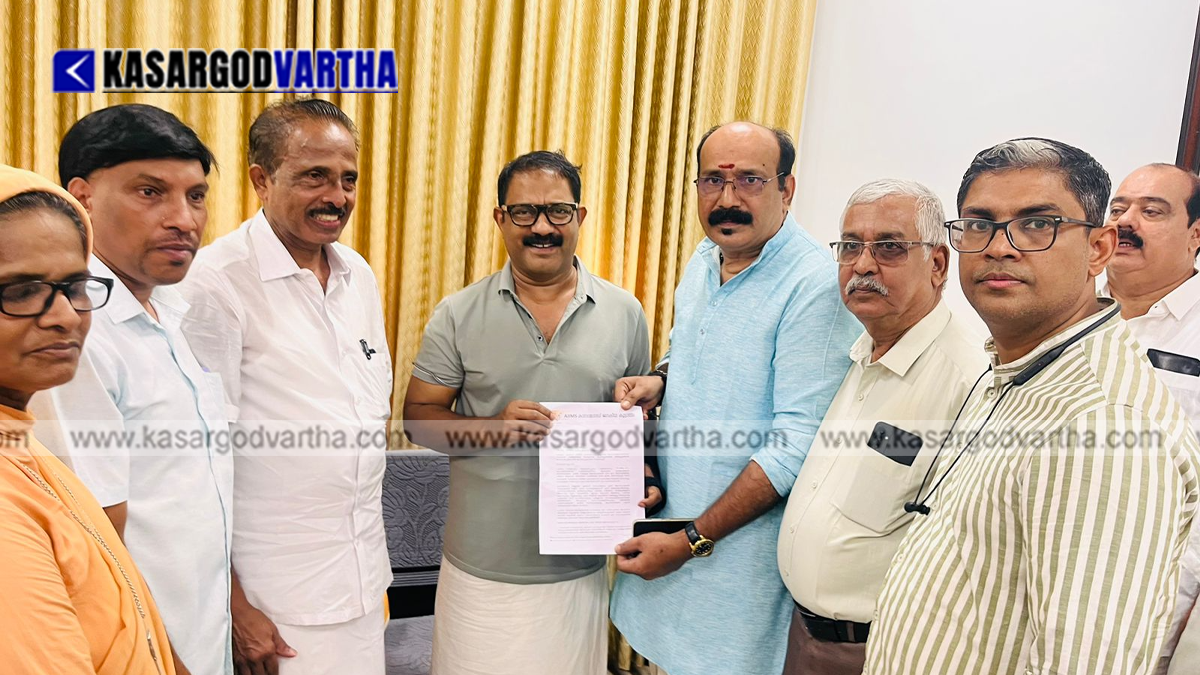  AIIMS Kasaragod Peoples Committee submitting petition to Minister KM Shaji.