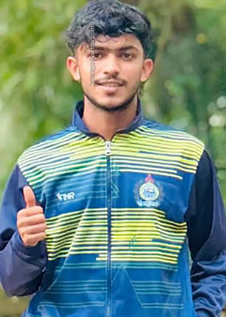 Five Kasaragod students selected for Mangalore University football team posing together.