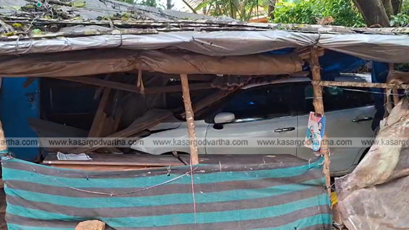 A car that crashed into a shop at Ambalathara, Kanhangad.
