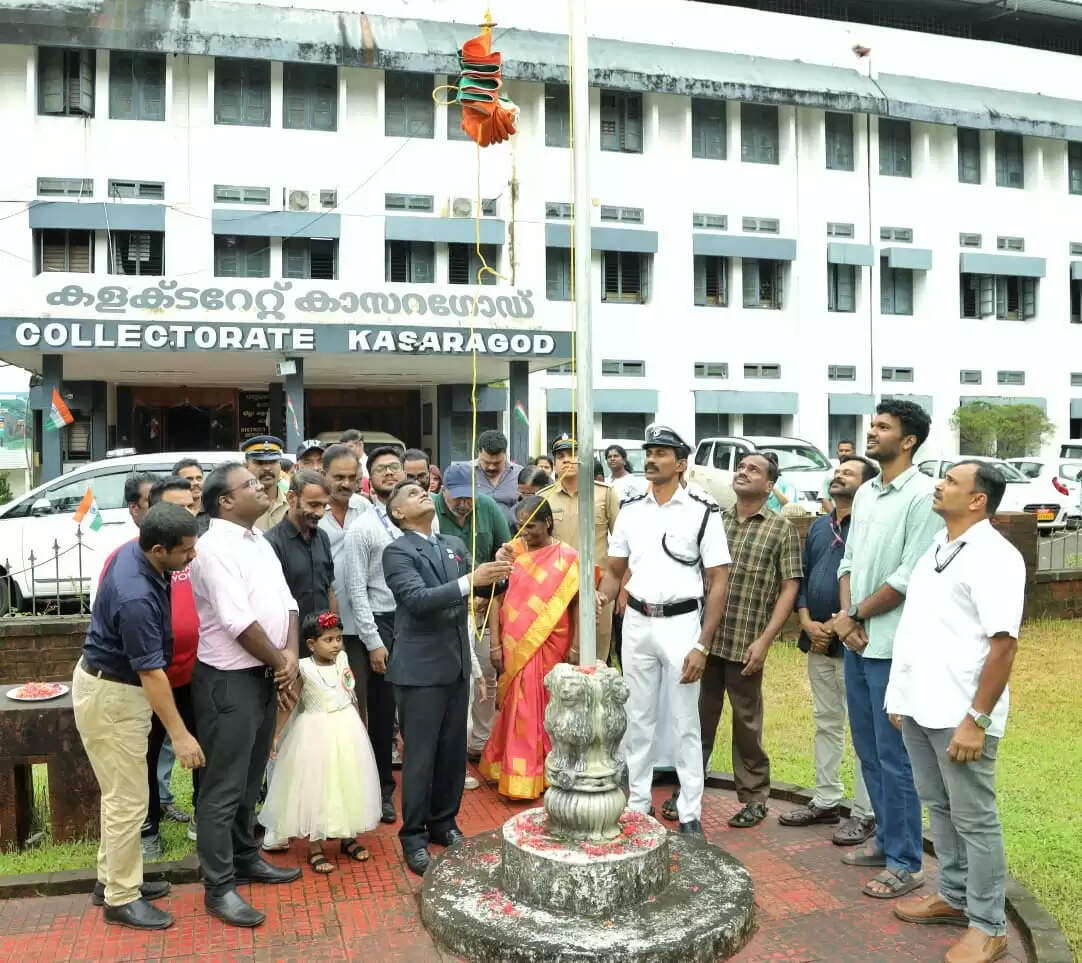 Minister K Krishnankutty inspecting the parade at Kasaragod Independence Day celebration.