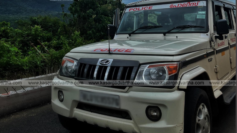 Police officers conducting a search operation for online fraud suspects.