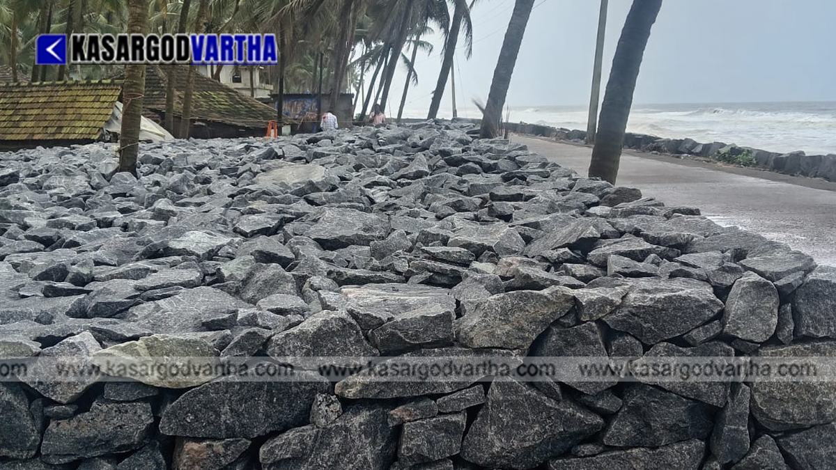 Representational image of severe coastal erosion and failed sea walls in Kasaragod