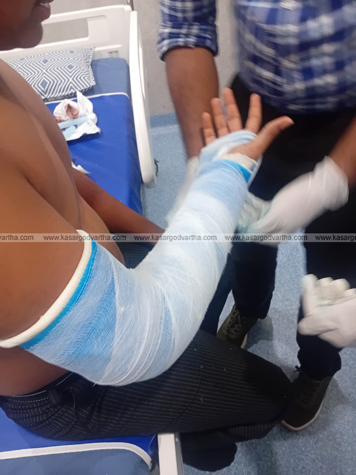 Student with a fractured and bandaged hand after Kalolsavam violence.