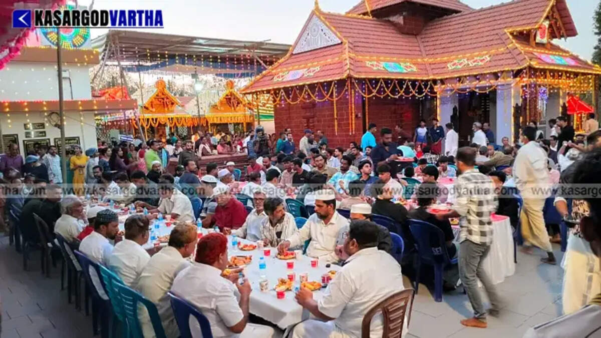 People from different religious backgrounds participating in an Iftar gathering at Poobanamkuzhi Temple.