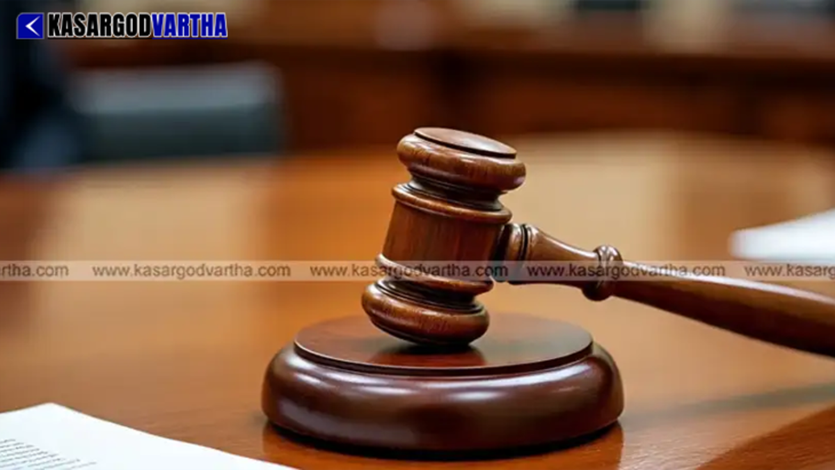 A wooden gavel and a law book representing the POCSO court verdict in Kanhangad.