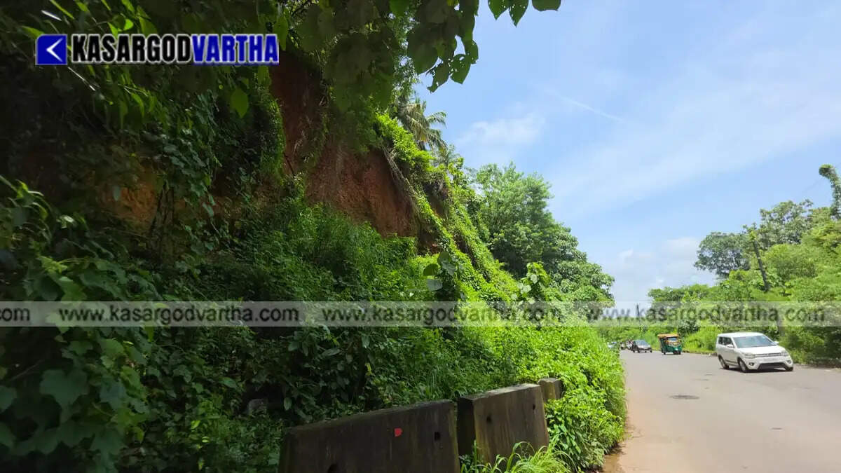 Representational image of a damaged road with a crater in Kasaragod