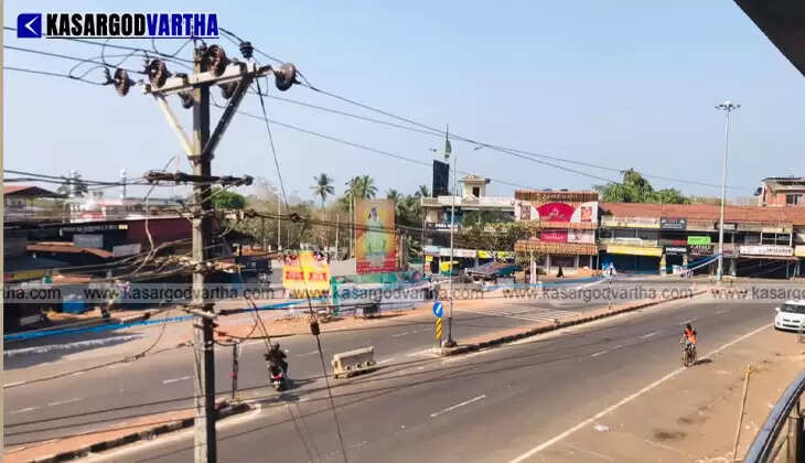 Stationary buses and empty roads in Kasaragod town during the national strike.