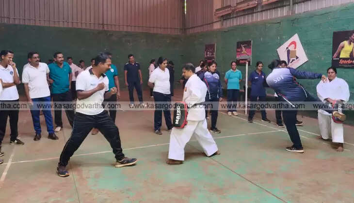 Police officers attending the martial arts training session for SPC project in Kasaragod.