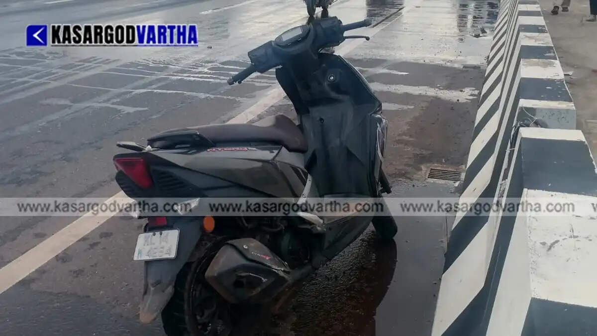 Tragic road accident in Shiriya: Youth from Udma dies, co-passenger critically injured as scooter hits national highway divider.