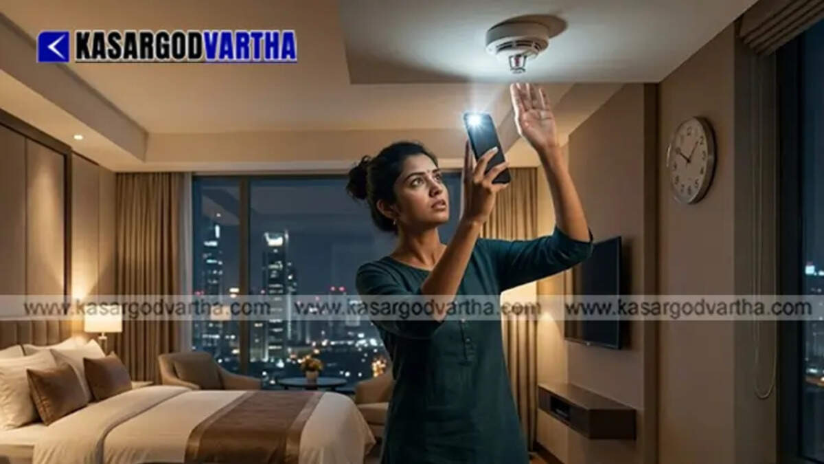 Woman using a detector to check for hidden cameras in a hotel room