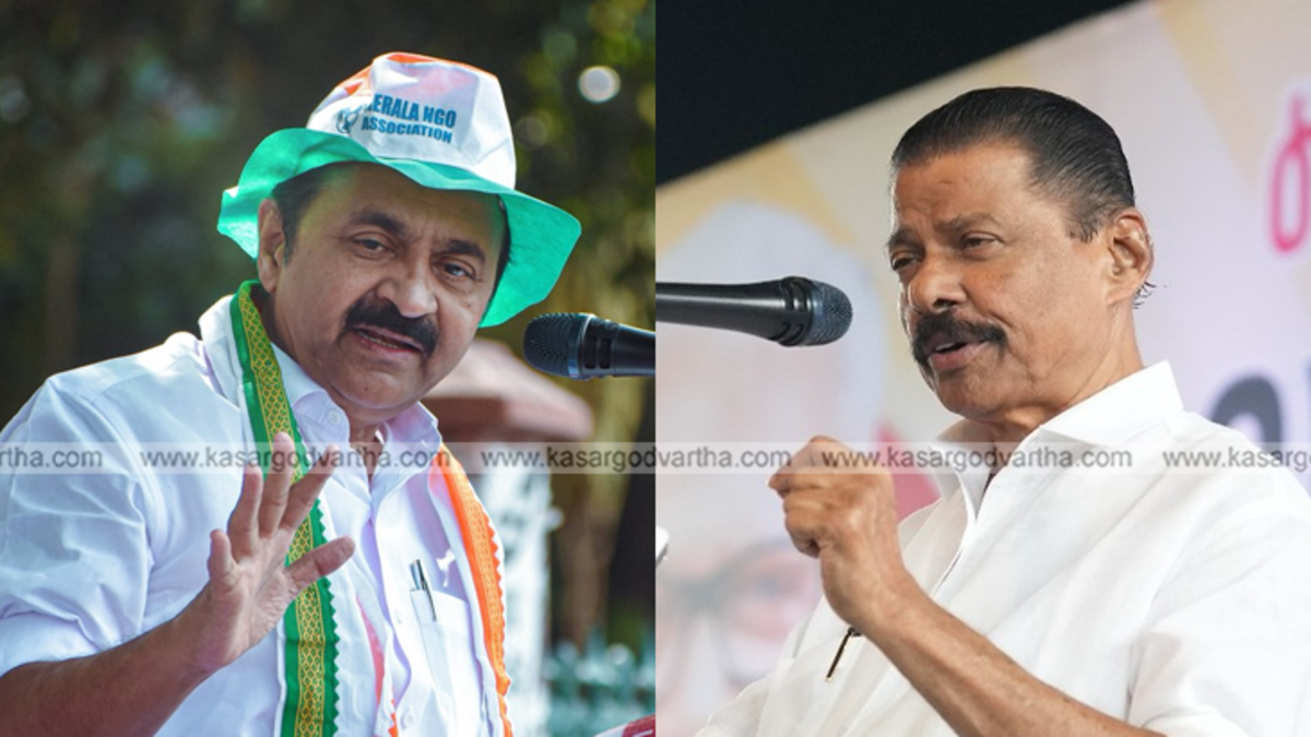 A generic image of a political rally in Kerala with party flags.