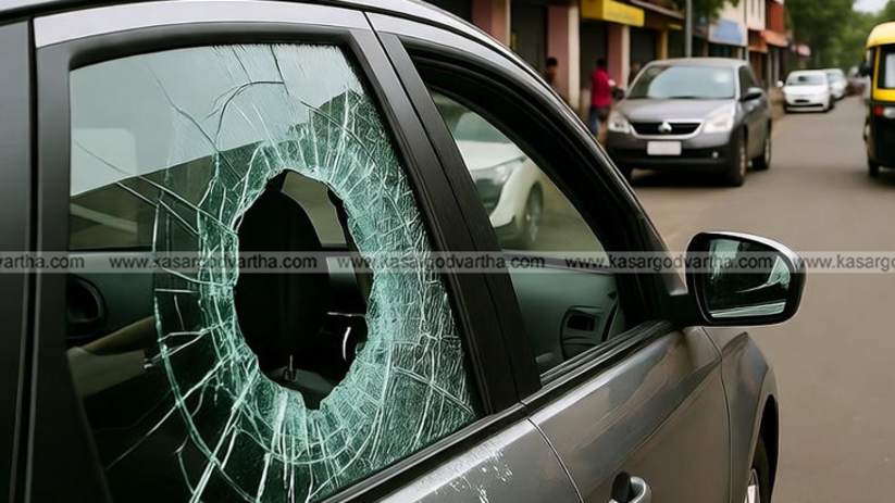  Car with broken side window after a theft in Tallur