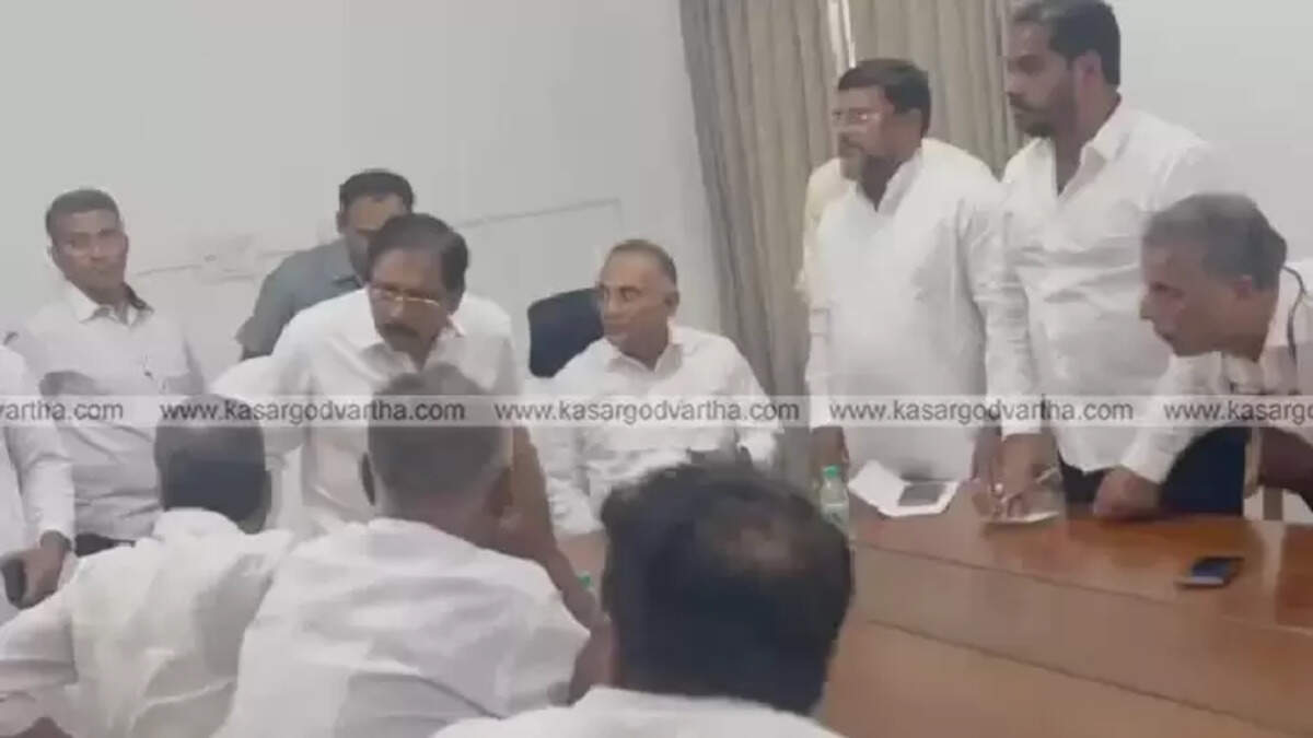 Congress leaders protest to Home Minister Dr. G. Parameshwara in the presence of Minister Dinesh Gundu Rao at Mangaluru Circuit House.