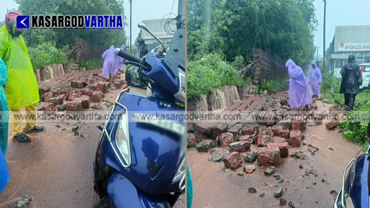 Conceptual image showing a collapsed stone wall on a road due to heavy rain.
