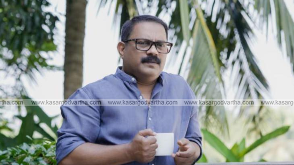 Muslim League leader K.M. Shaji speaking at a public event.