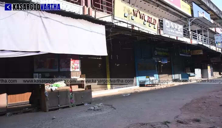 Stationary buses and empty roads in Kasaragod town during the national strike.