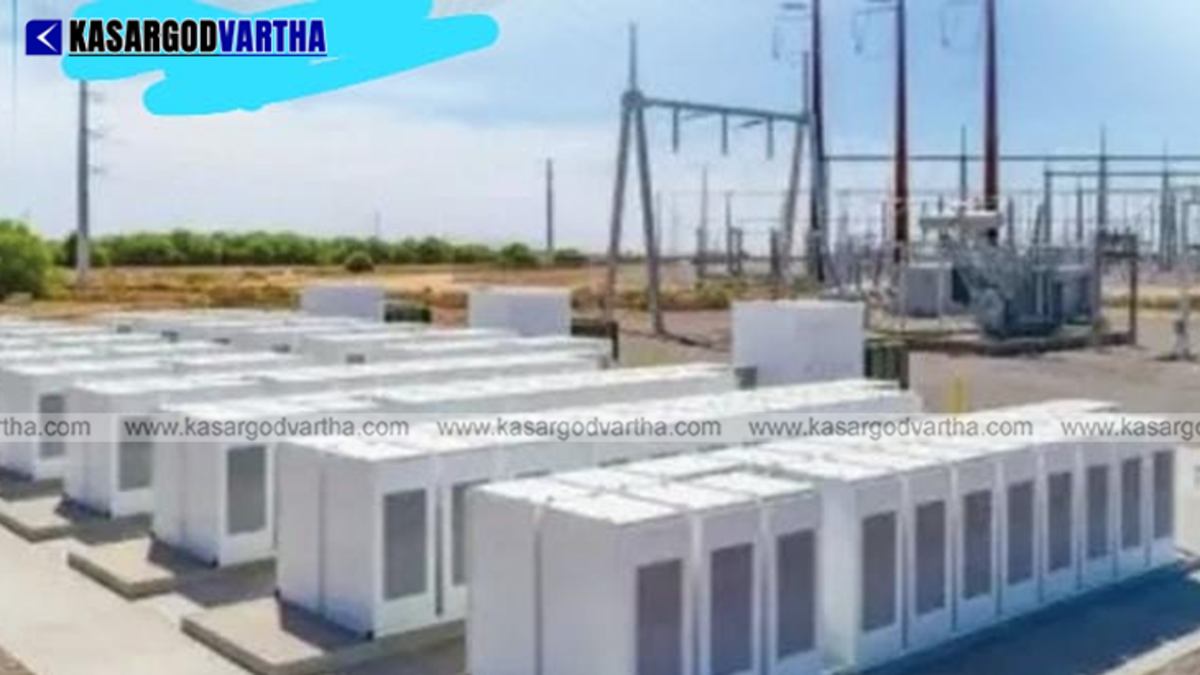  Industrial scale battery energy storage system units being installed at a power station.
