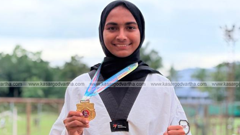 Fatima with gold medal in Taekwondo