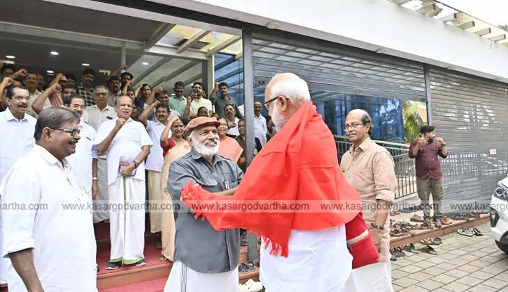 M.A. Baby speaking at a public event in Kasarcode.